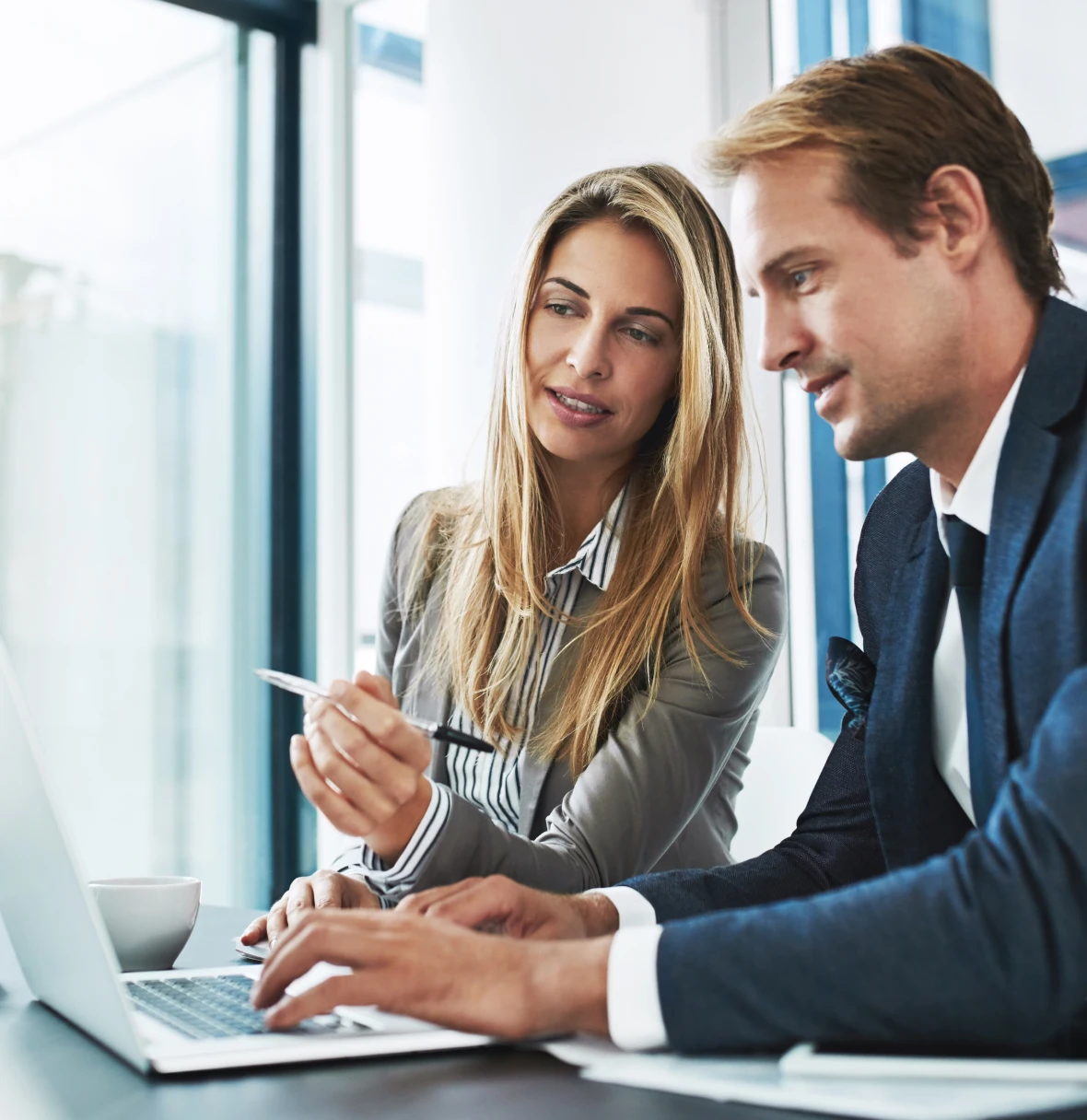 Professionals collaborating in modern office